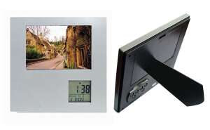 Rotating photo frame with alarm clock thermometer