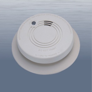 family-using co alarm