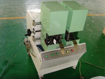 automatic eyelet punching machine