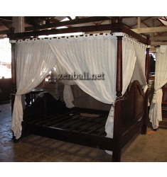 wooden canopy bed