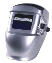 Auto-darkening welding helmet