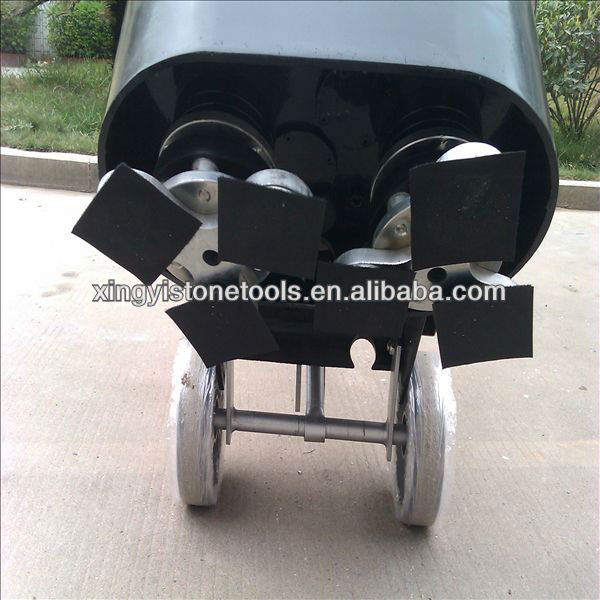 Floor grinder for concrete coatings