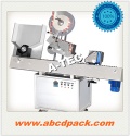 Automatic round bottle rolling labeling machine