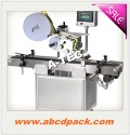 Automatic top labeling machine