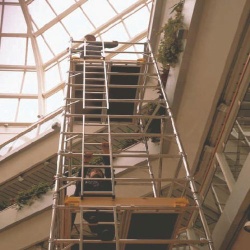 Aluminum tower with ladder frame