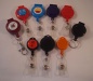 Retractable badge reel, badge holder