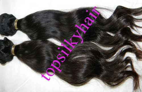 Natural wavy Peruvian hair machine wefts