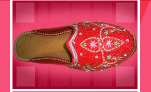 Mojari footwear having beads and sequin work, embroidered with zardozi.