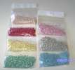 PP repro pellets in various light colors (pink, grey, red, blue, yellow, red, green)